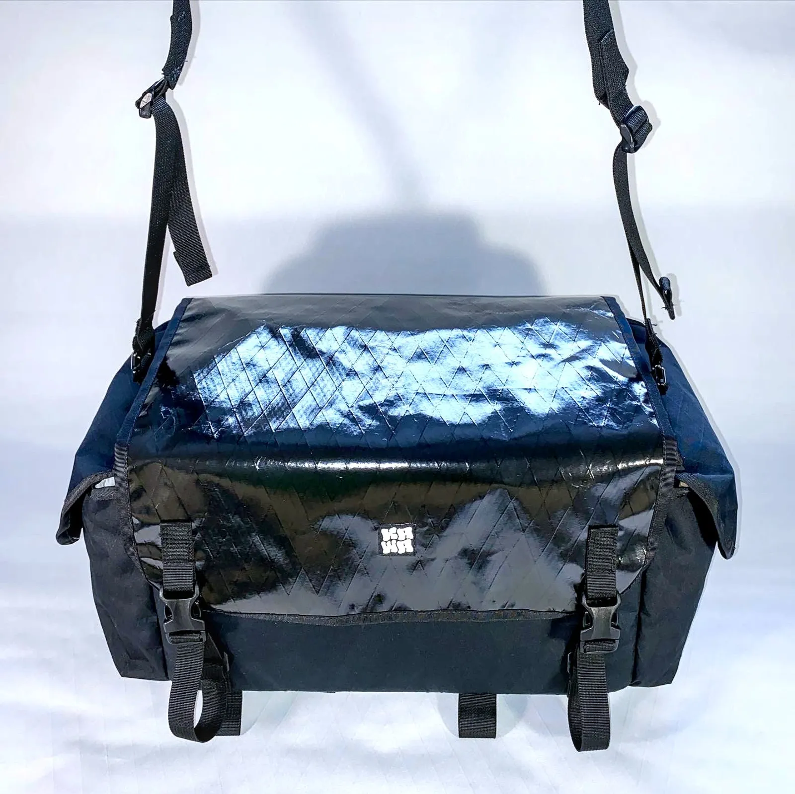 A black rack bag on white background