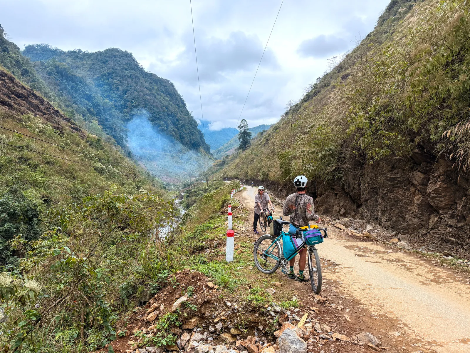 Biking up a mountain dirt road