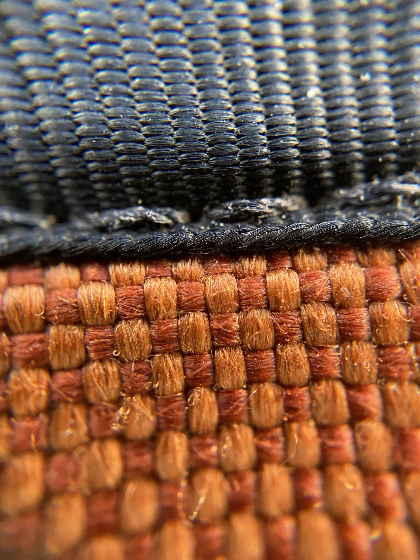 A zoomed in shot of fabric and stitching