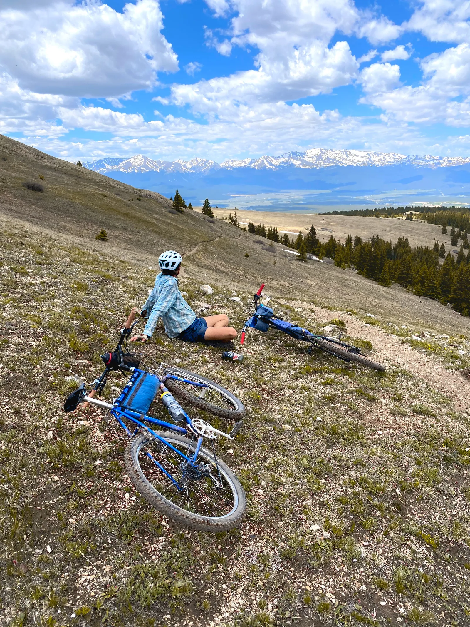 Laying on a mountain path with bikes