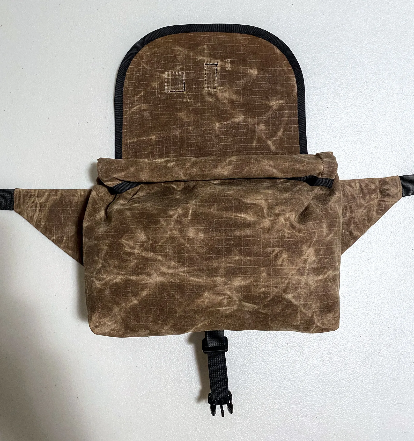 Kawa hip pack with its lid flap up