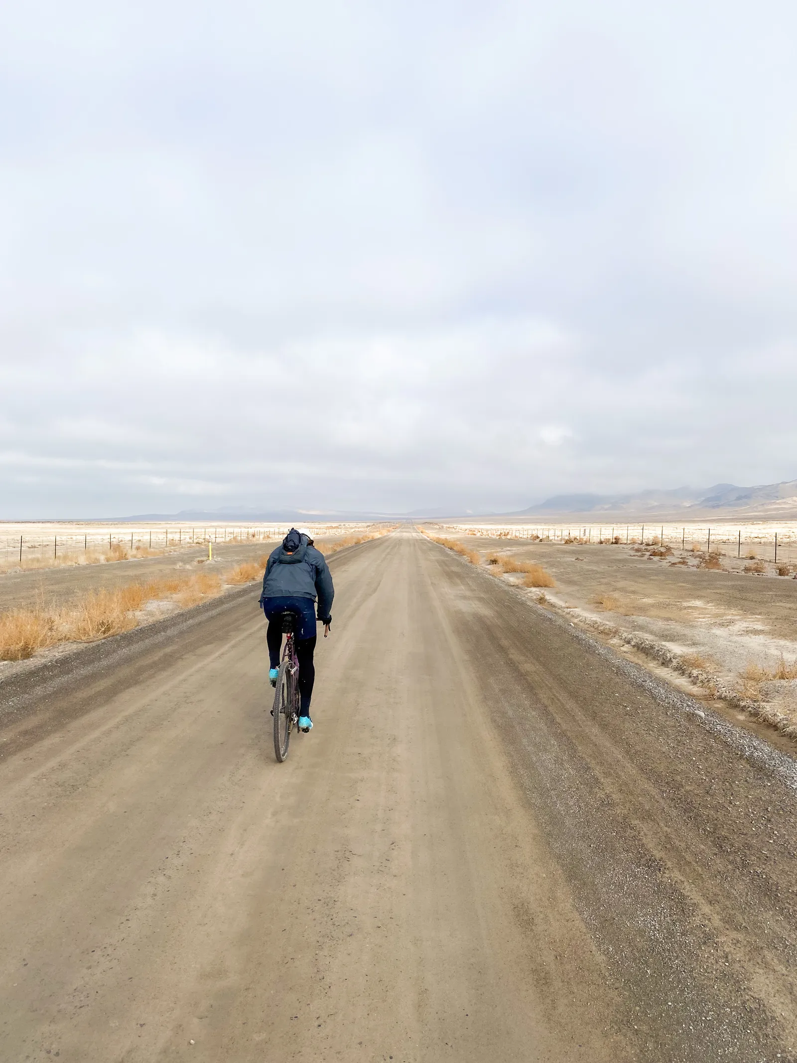 Thomas biking on a dirt road outside Delle